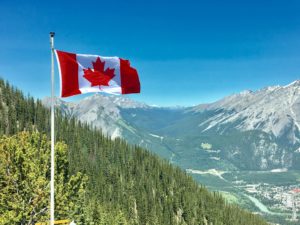 canadaflagwithmountainrangeviewscaledjpg