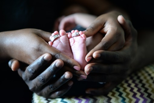 What type of visa can I use to stay if my baby was born in Canada